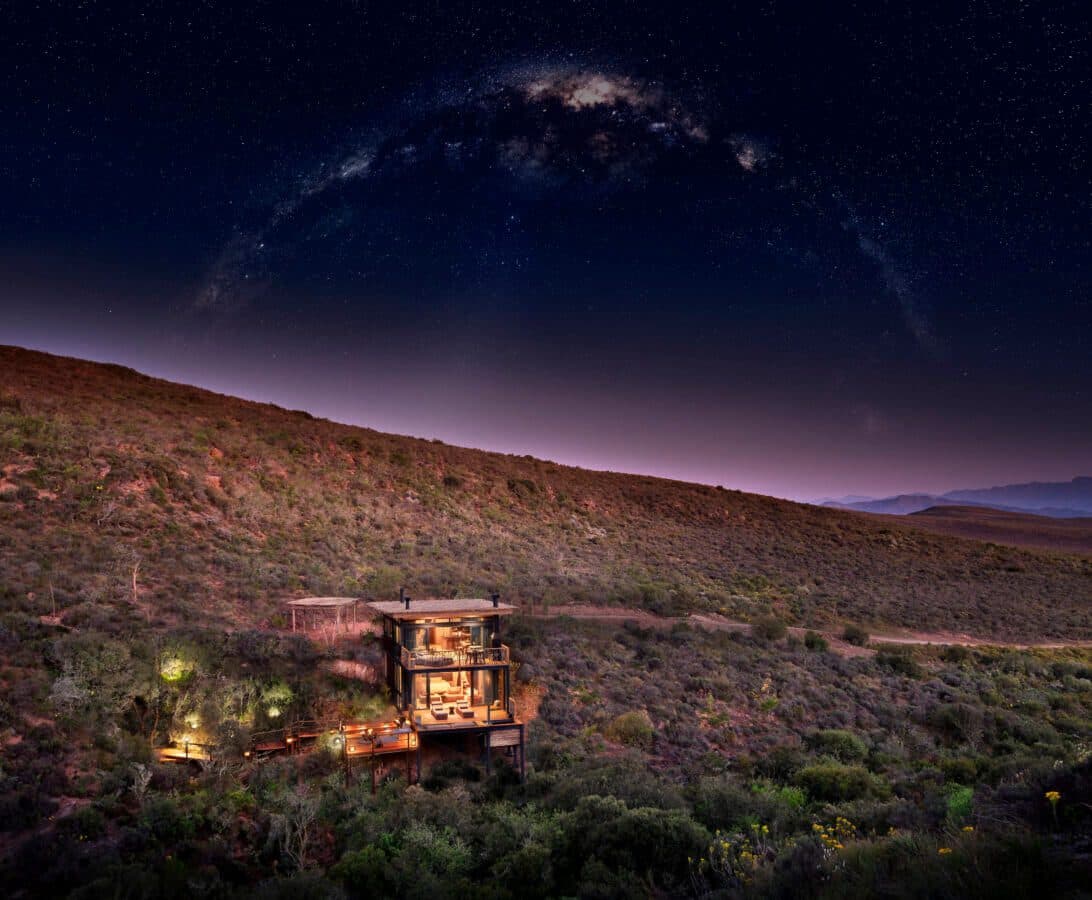 Melozhori Treehouse: Glowing cabin under Milky Way arch on Karoo hillside